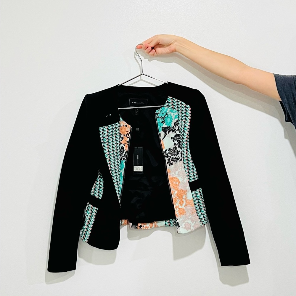 Cute BCBG Blazer with a floral edge.